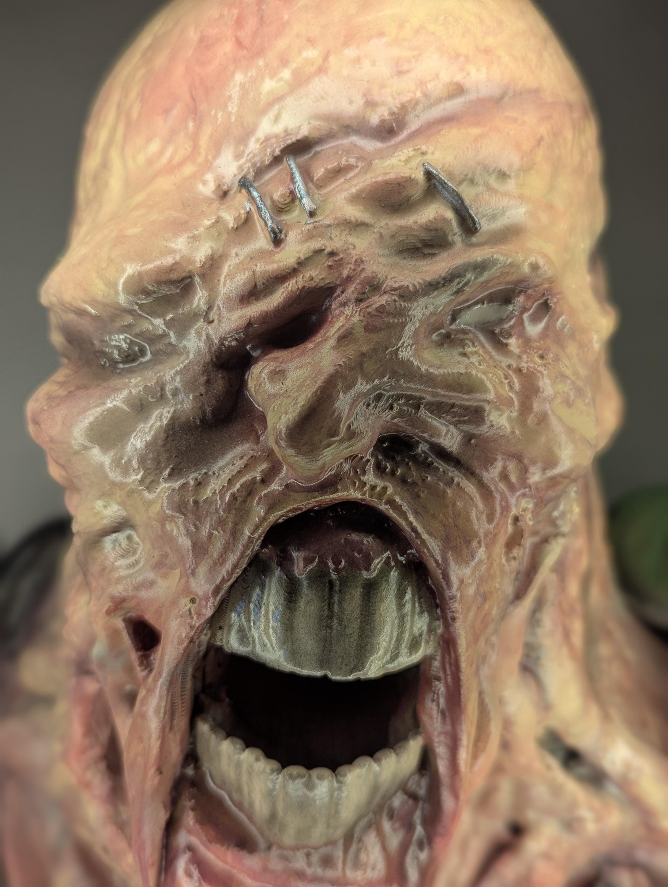 Nemesis – Resident Evil Wall Bust | Handcrafted 3D Horror Sculpture on Umbrella Logo