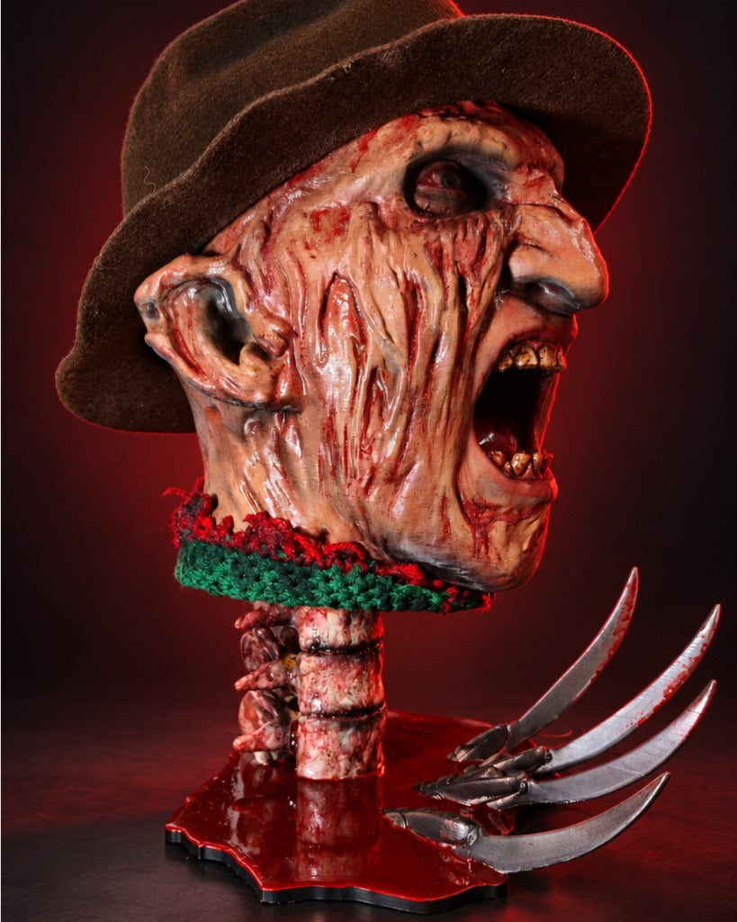 RELICS: The Last Cut - The Dream Stalker II - Profile with exposed spine and claw blades in blood pool